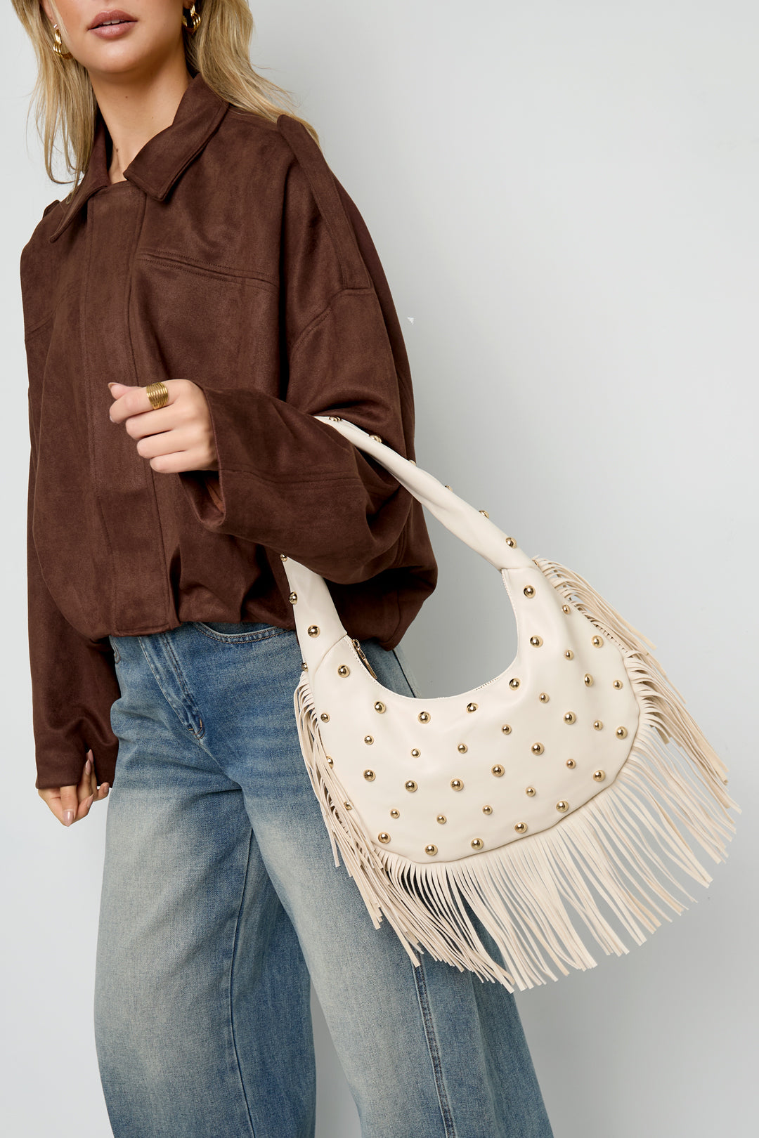 Borsa a mano borchiata