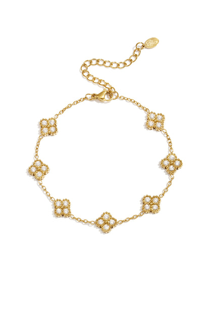 Bracciale con quadrifogli incastonati in zirconi